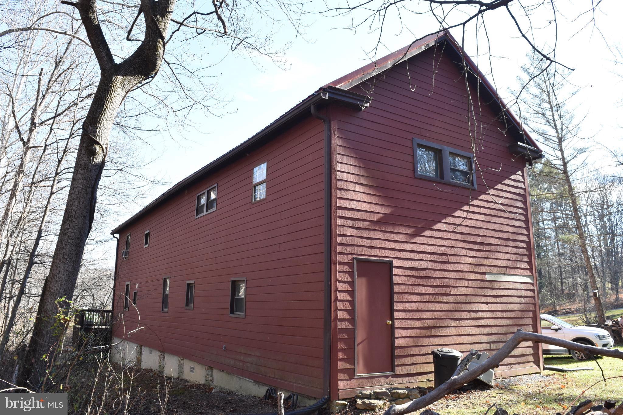 1417 Mountainside Road Berkeley Springs, WV 25411 - Photo 54 of 76 Charming rustic home nestled in nature.