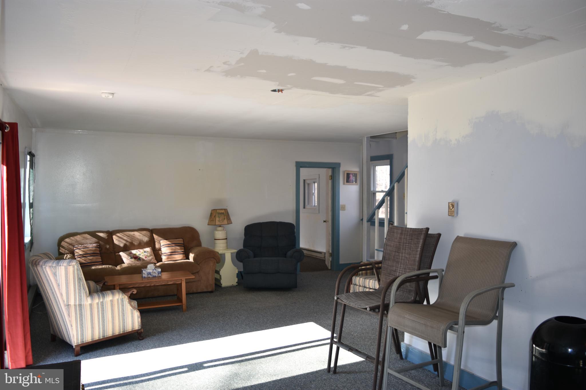 1417 Mountainside Road Berkeley Springs, WV 25411 - Photo 6 of 76 Spacious living area with natural light.