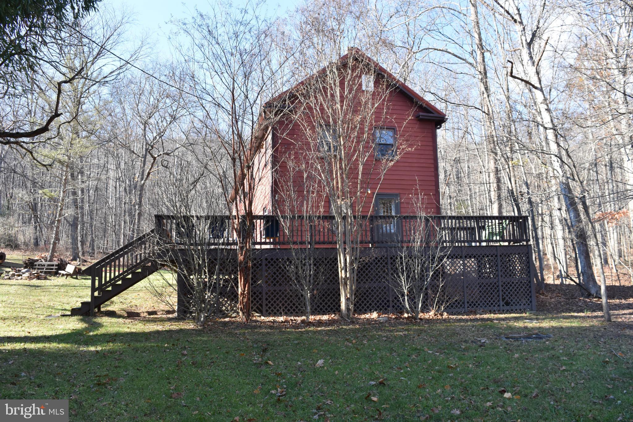 1417 Mountainside Road Berkeley Springs, WV 25411 - Photo 61 of 76 Charming red home nestled in serene woods.