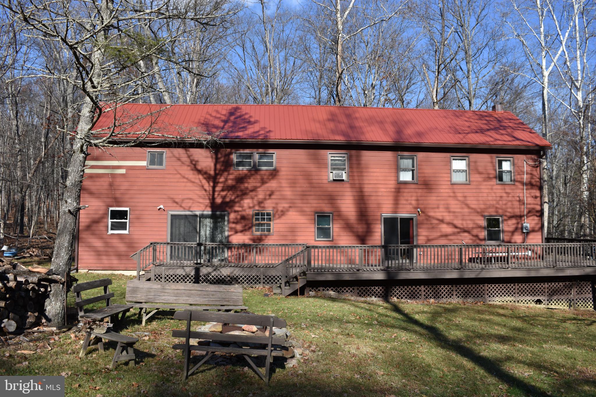 1417 Mountainside Road Berkeley Springs, WV 25411 - Photo 69 of 76 Charming red retreat nestled in nature.