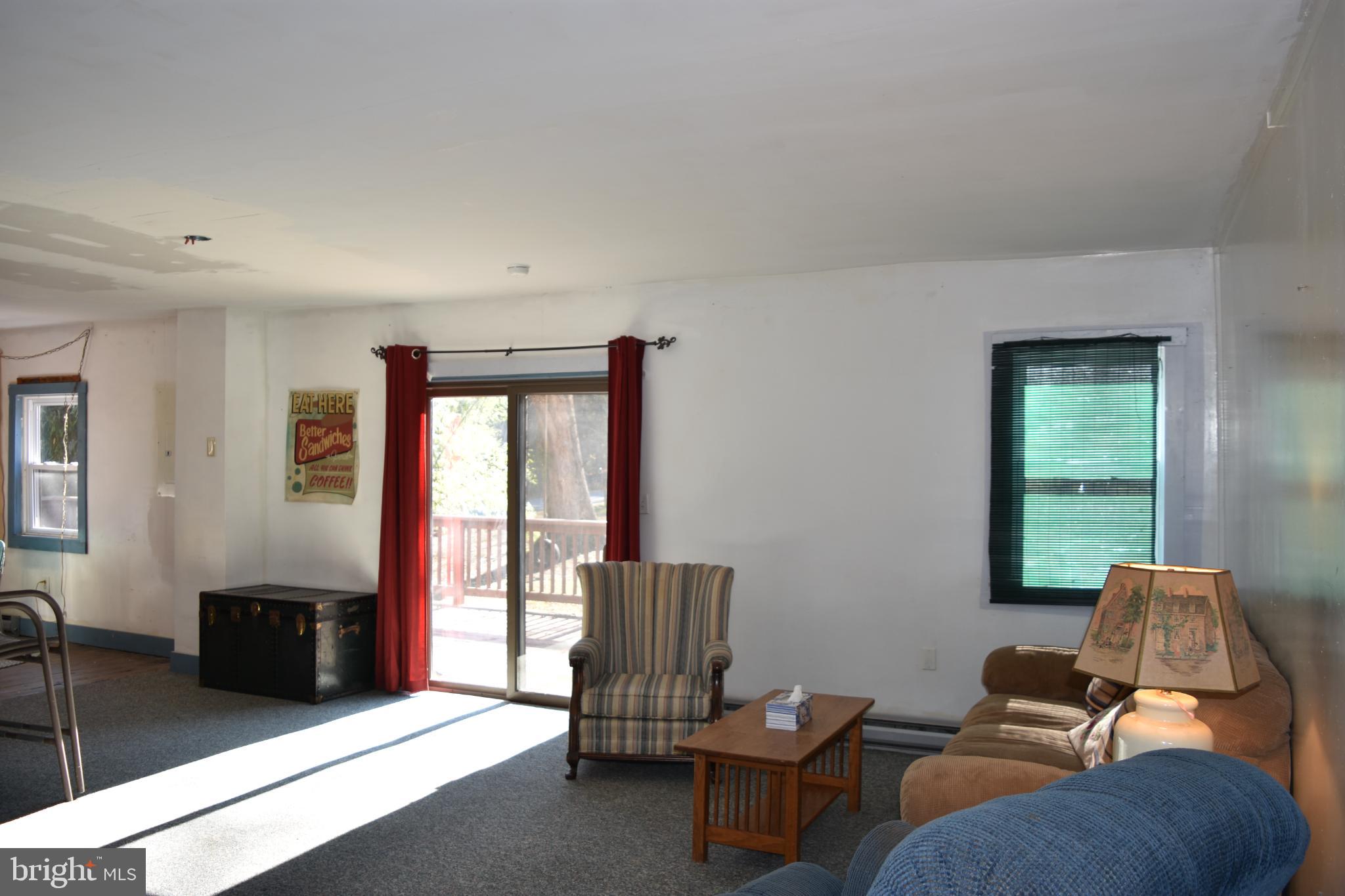 1417 Mountainside Road Berkeley Springs, WV 25411 - Photo 8 of 76 Bright and inviting living space with natural l...