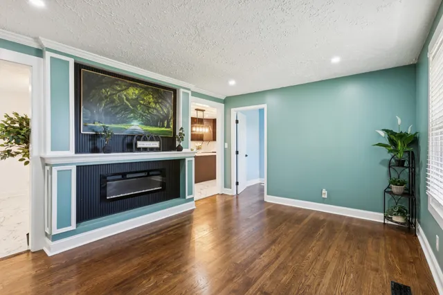 a room with furniture and a fireplace