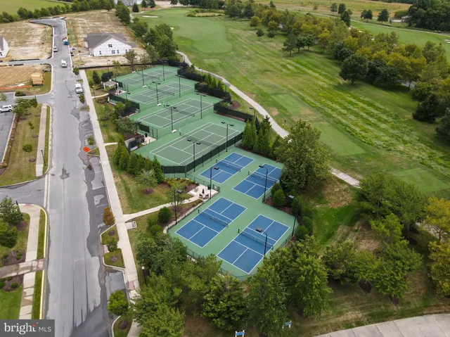 a view of a lake with houses with outdoor space