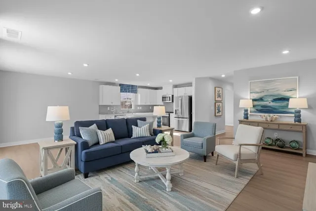 a living room with furniture and a table