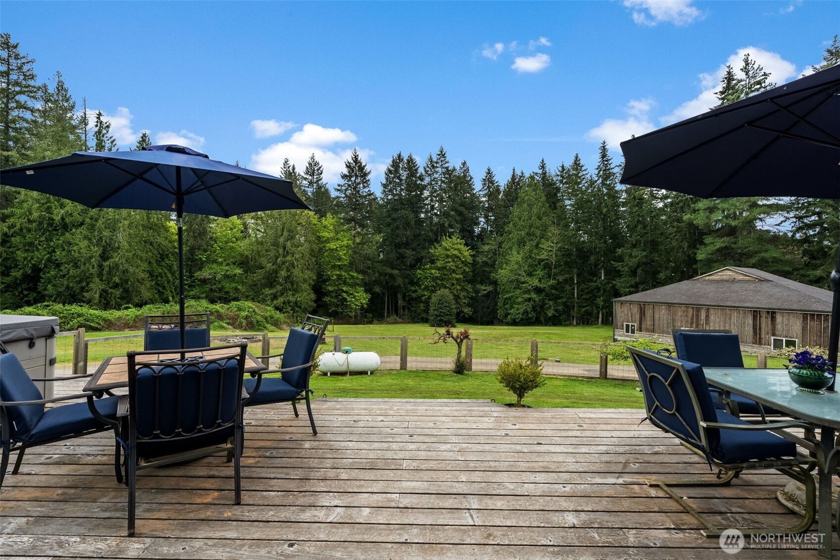 1998 Northwest Luoto Road Poulsbo, WA 98370 - Photo 28 of 40 a view of a patio with furniture and a yard