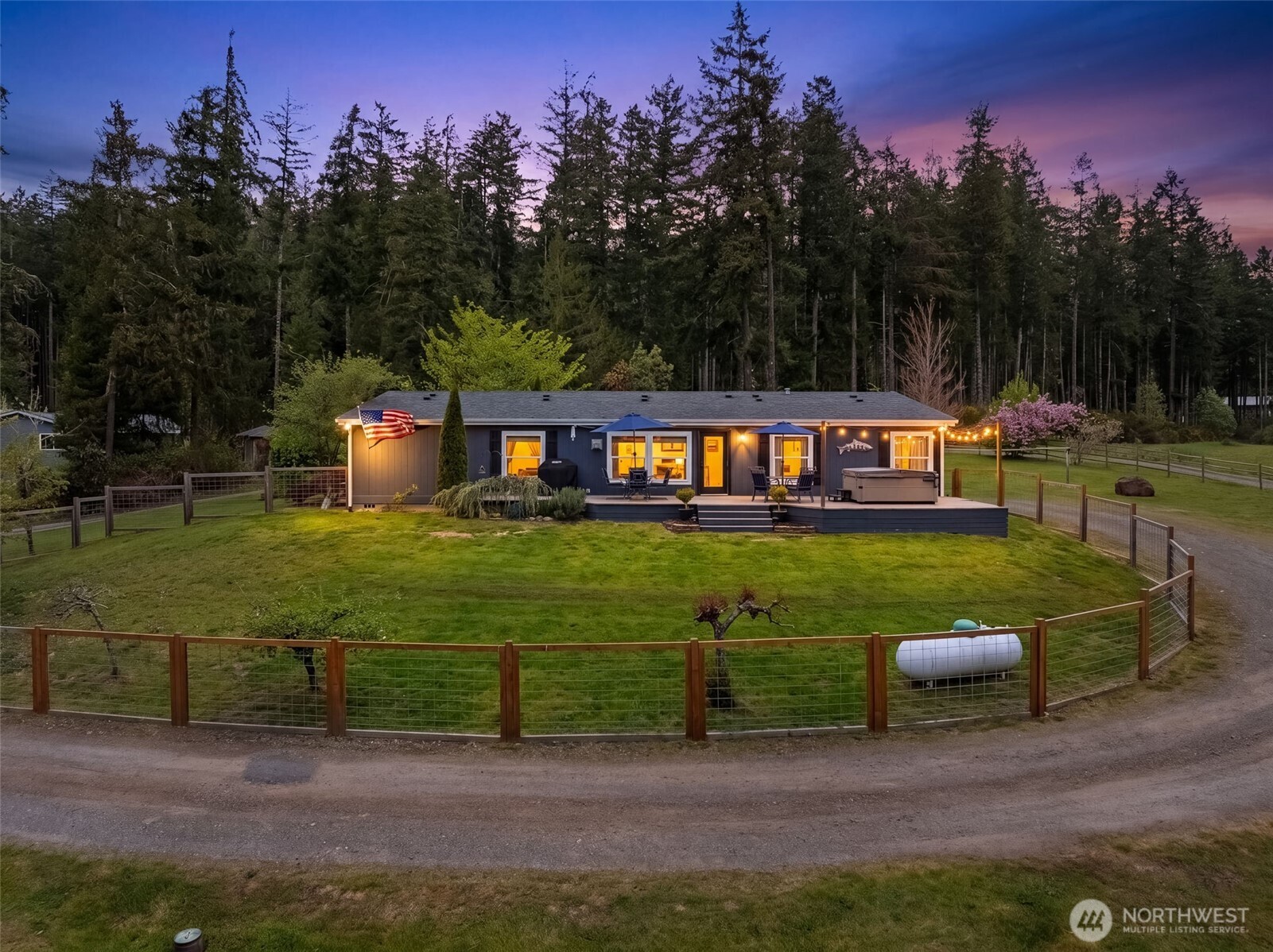 1998 Northwest Luoto Road Poulsbo, WA 98370 - Photo 36 of 40 a view of an house with outdoor space and seating area