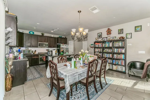 a view of a dining room with furniture