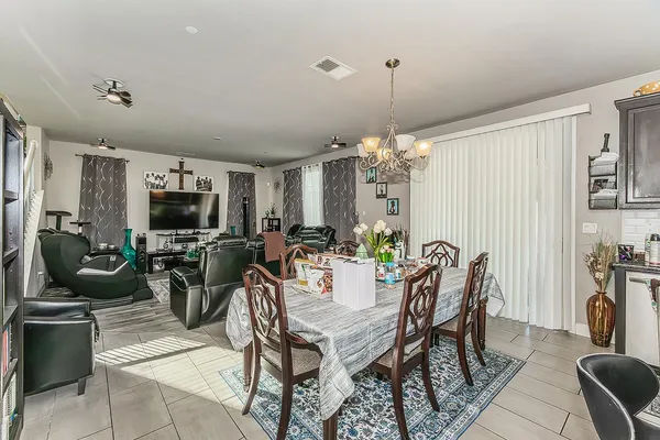 a room with furniture and a wooden floor