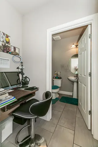 a room with furniture and a wooden floor