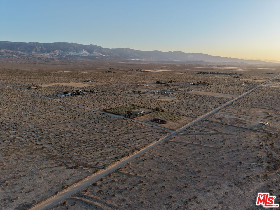 10424 Santa Fe Fire Road Lucerne Valley, CA 92356 - Photo 14 of 33 a view of an ocean beach and mountain