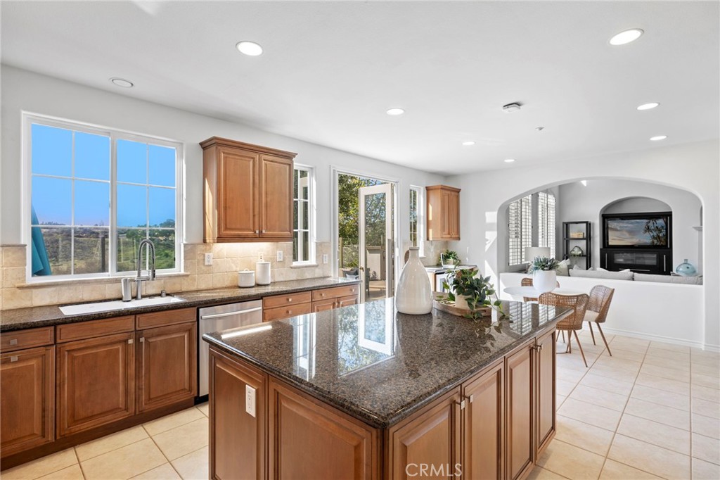 15 Mason Lane Ladera Ranch, CA 92694 - Photo 13 of 40 a kitchen with granite countertop lots of counter top space and dining table