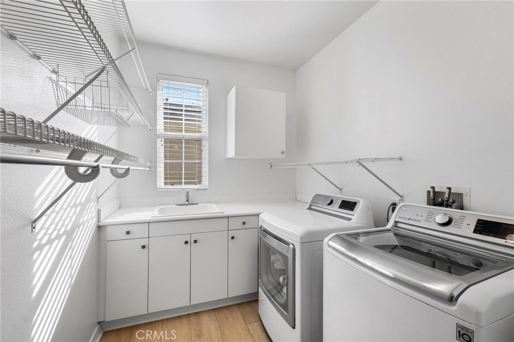 15 Mason Lane Ladera Ranch, CA 92694 - Photo 27 of 40 a utility room with dryer and washer