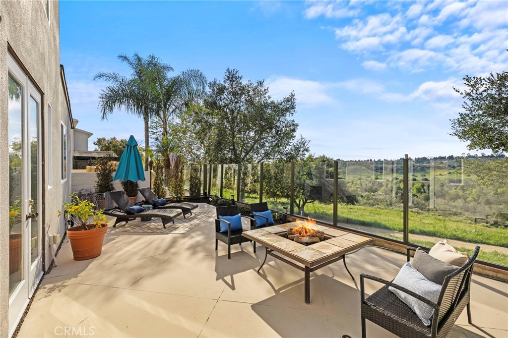 15 Mason Lane Ladera Ranch, CA 92694 - Photo 29 of 40 a backyard of a house with outdoor seating