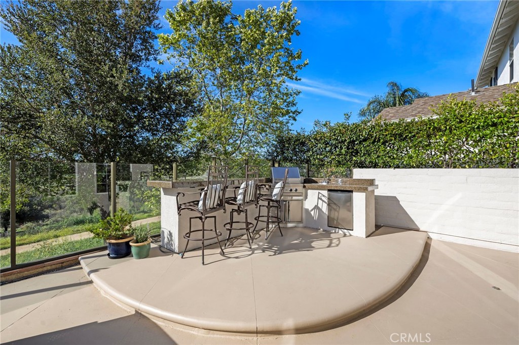 15 Mason Lane Ladera Ranch, CA 92694 - Photo 32 of 40 a view of a chairs and table in the patio