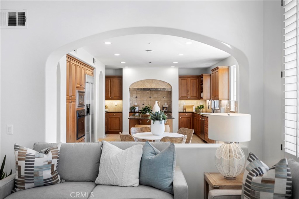15 Mason Lane Ladera Ranch, CA 92694 - Photo 10 of 40 a living room with furniture and a large window