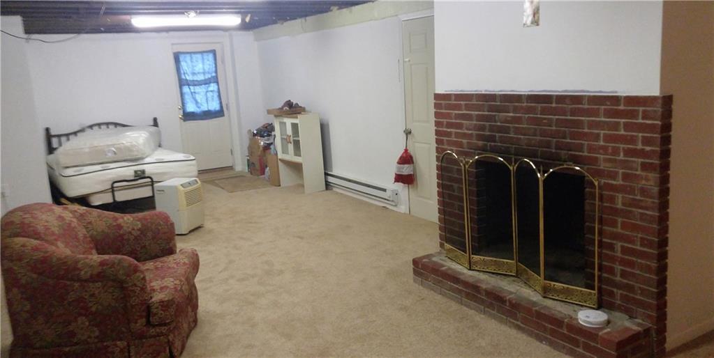 933 East Pike Road Indiana, PA 15701 - Photo 13 of 13 Fireplace offers great charm to this downstairs family room