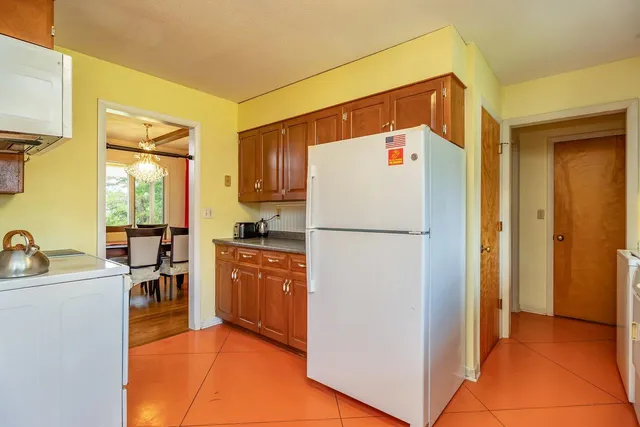 a kitchen with stainless steel appliances granite countertop a stove and a sink with granite countertops