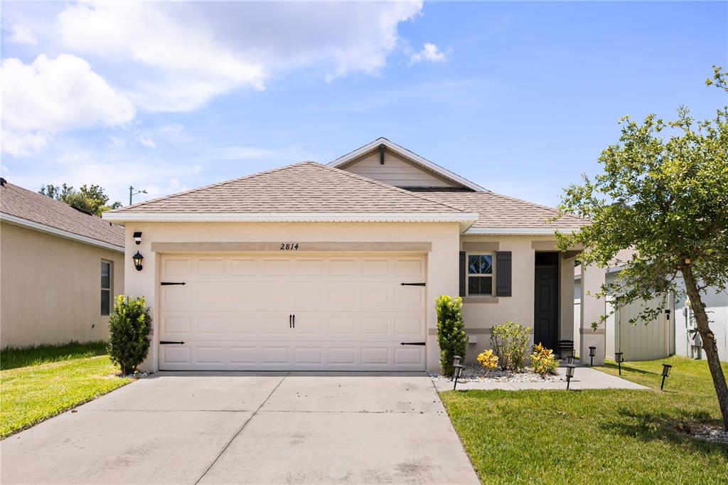 a front view of house with yard