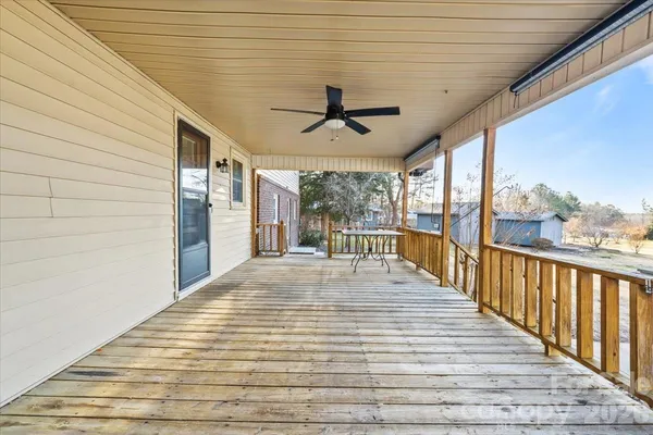 a view of outdoor space with wooden floor and outdoor space