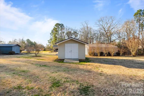 a house view with yard in front of it
