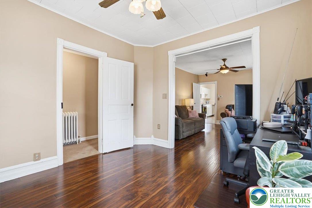 525 Ridge Street Emmaus, PA 18049 - Photo 30 of 68 This versatile room features warm flooring and bright trim, ideal for living or working.
