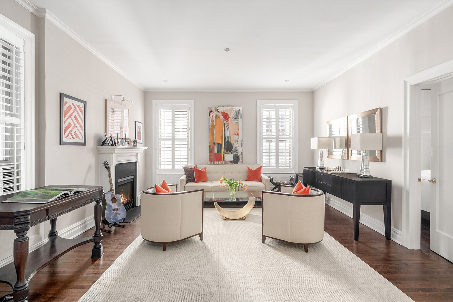 17 East 95th Street, Unit 4R Manhattan, NY 10128 - Photo 1 of 8 a living room with furniture and a window