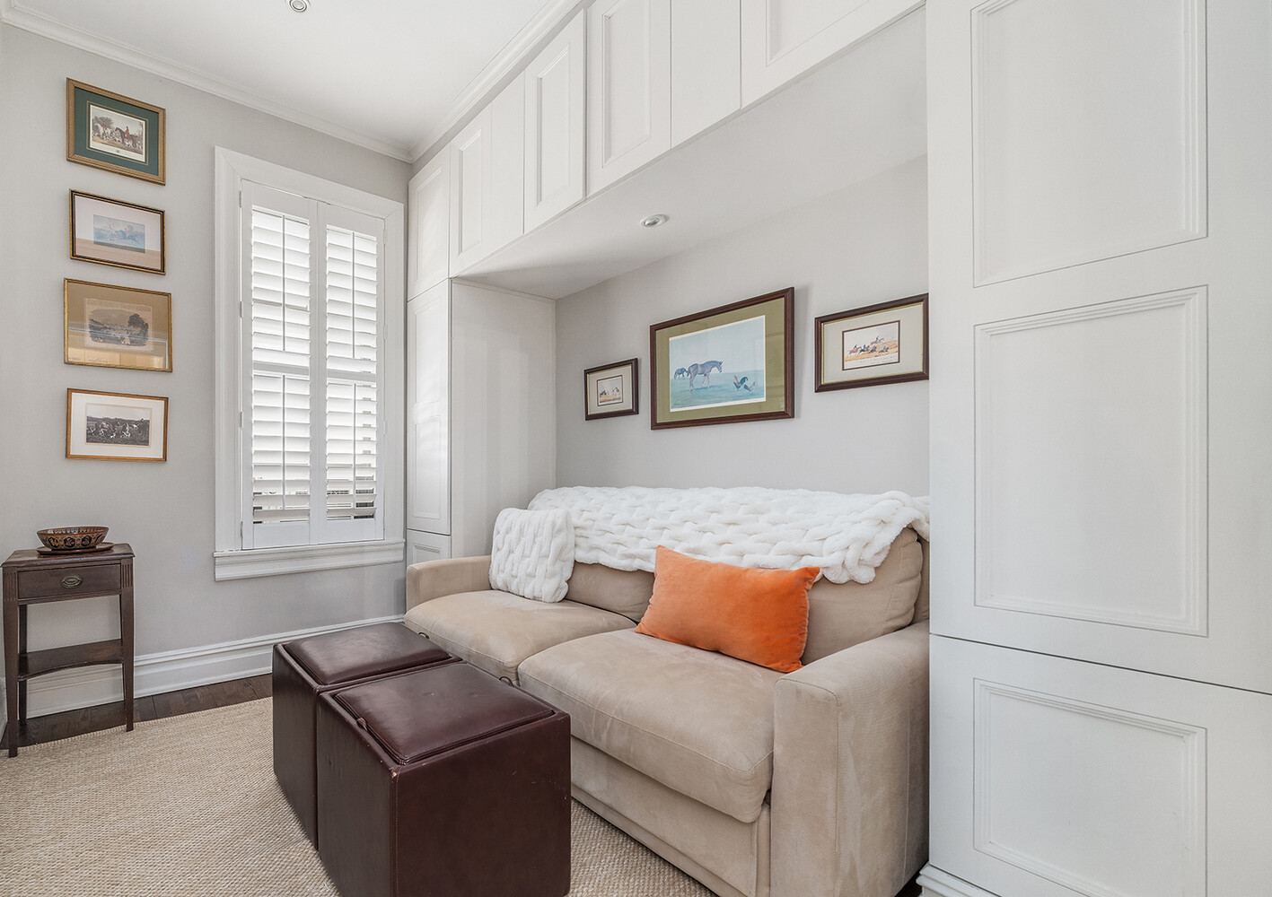 17 East 95th Street, Unit 4R Manhattan, NY 10128 - Photo 6 of 8 a living room with furniture and a window