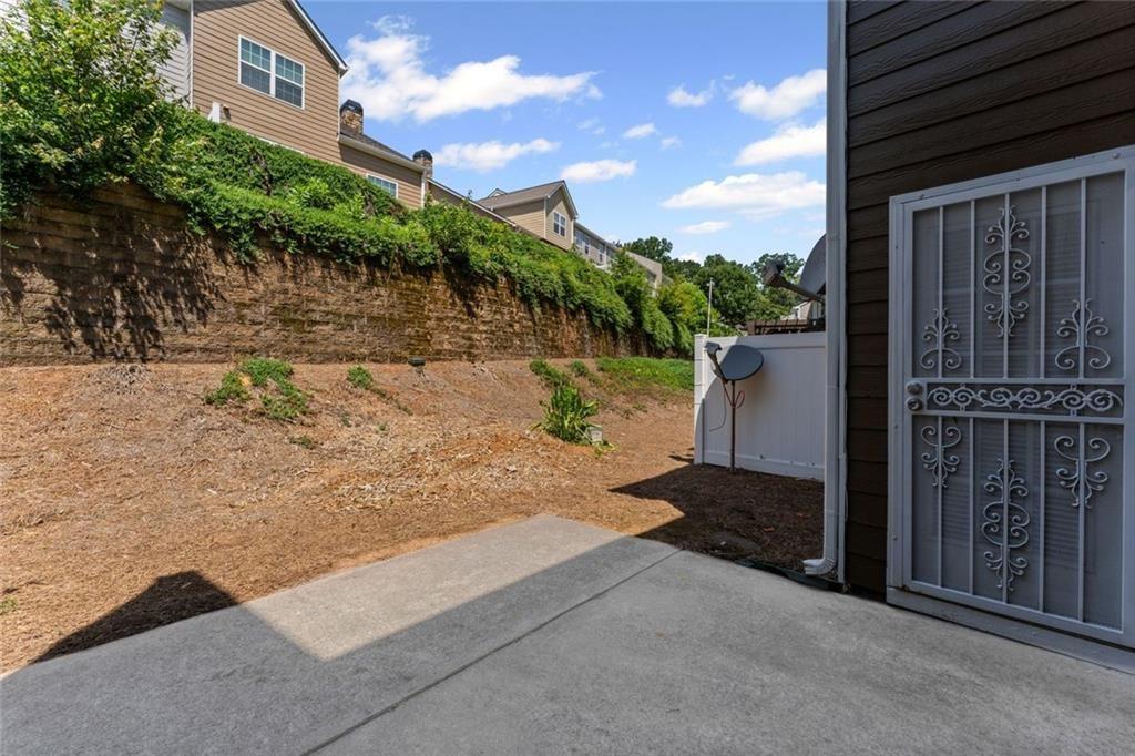 2743 Pierce Brennen Court Northeast Lawrenceville, GA 30043 - Photo 26 of 31 a view of a backyard of the house