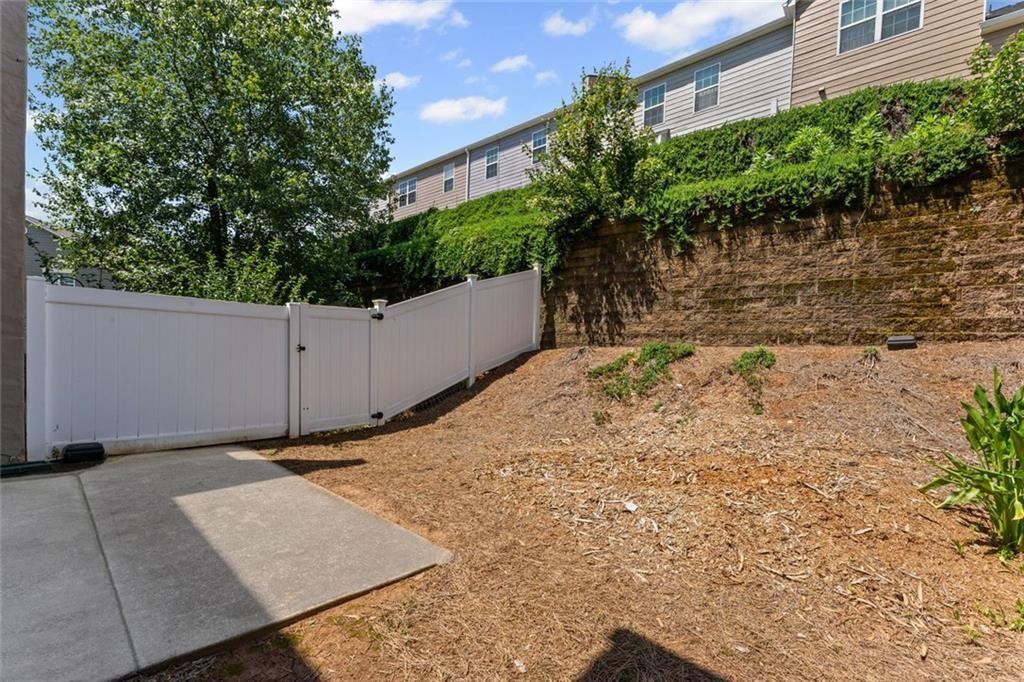 2743 Pierce Brennen Court Northeast Lawrenceville, GA 30043 - Photo 27 of 31 a backyard of a house