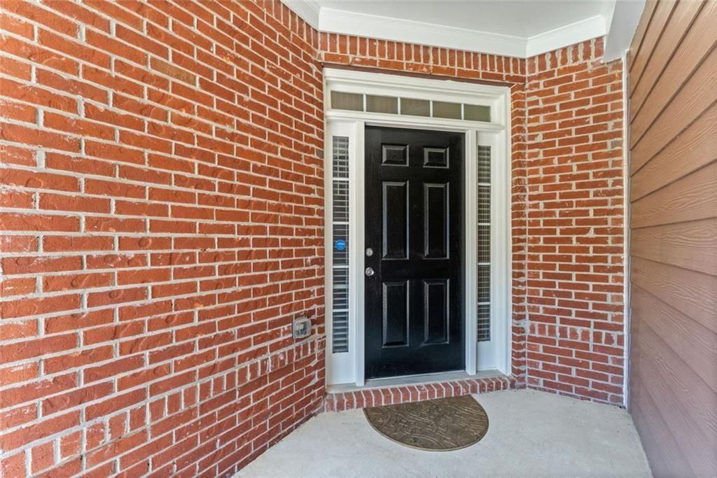 2743 Pierce Brennen Court Northeast Lawrenceville, GA 30043 - Photo 3 of 31 a view of a brick house