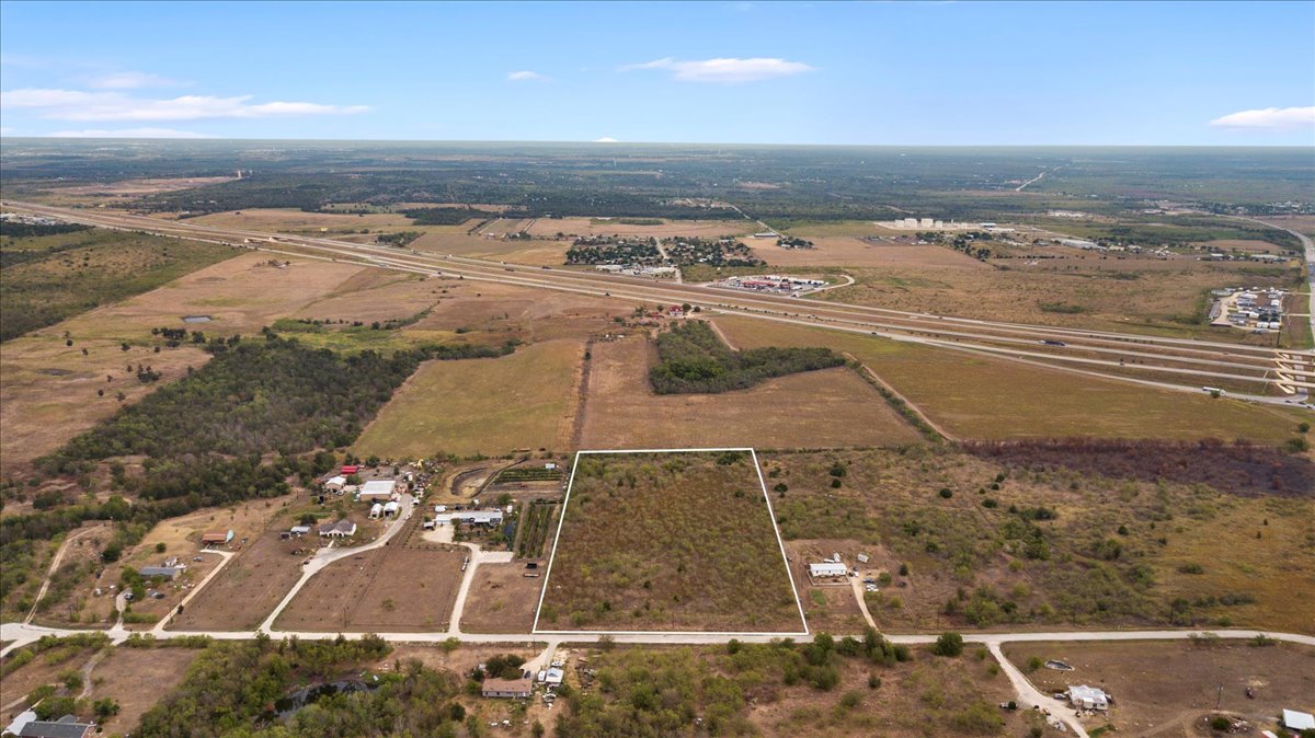 Tbd Ranchero Drive Buda, TX 78610 - Photo 8 of 10 Aerial view of property and surrounding area featuring rural landscape