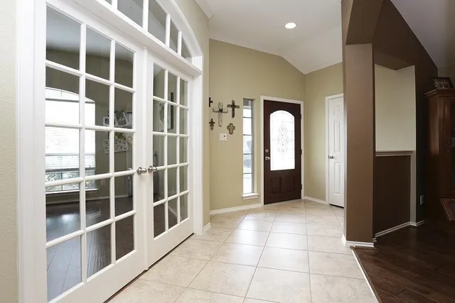 a view of a big room with wooden shelves