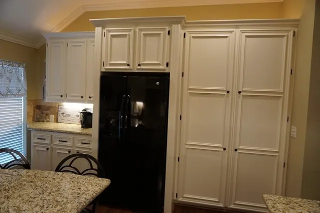 a view of a kitchen with a sink