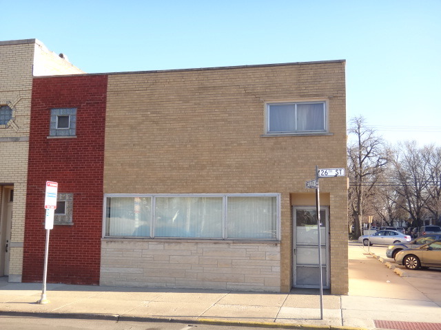 6646 26th Street Berwyn, IL 60402 - Photo 2 of 4 a brick building with a street
