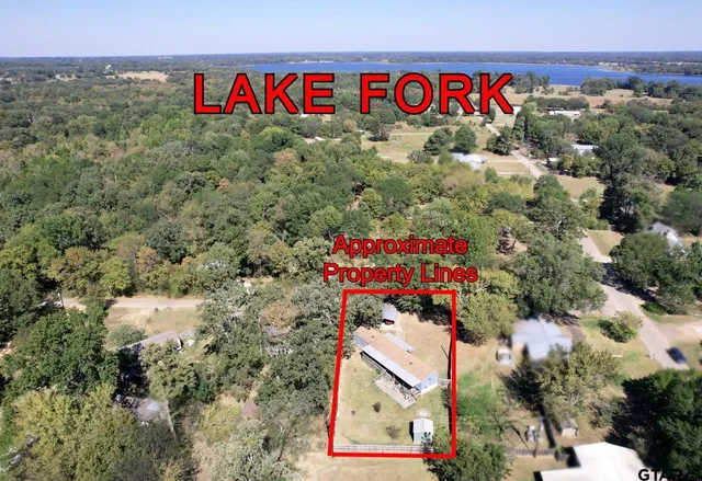 a view of a porch with wooden floor