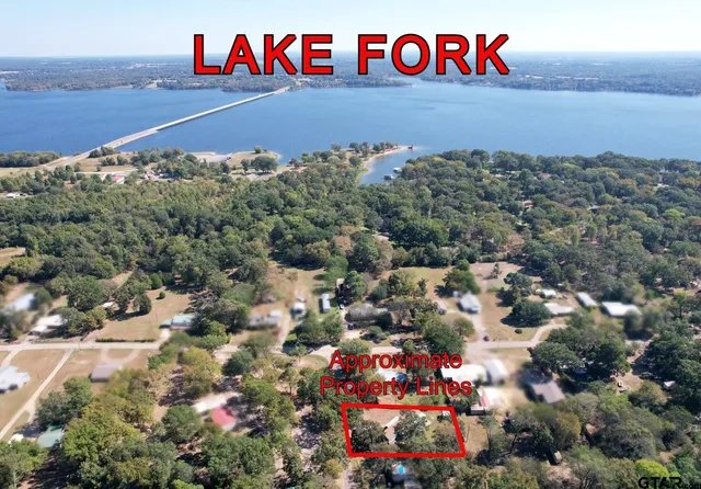 a view of balcony with deck and wooden floor