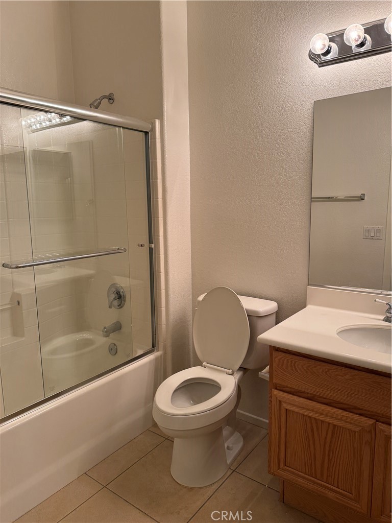 13628 Jeremy Court Rancho Cucamonga, CA 91739 - Photo 19 of 29 a bathroom with a sink a toilet and shower
