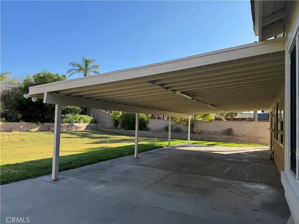 a view of swimming pool with small yard