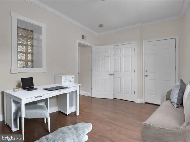 a workspace with furniture and window