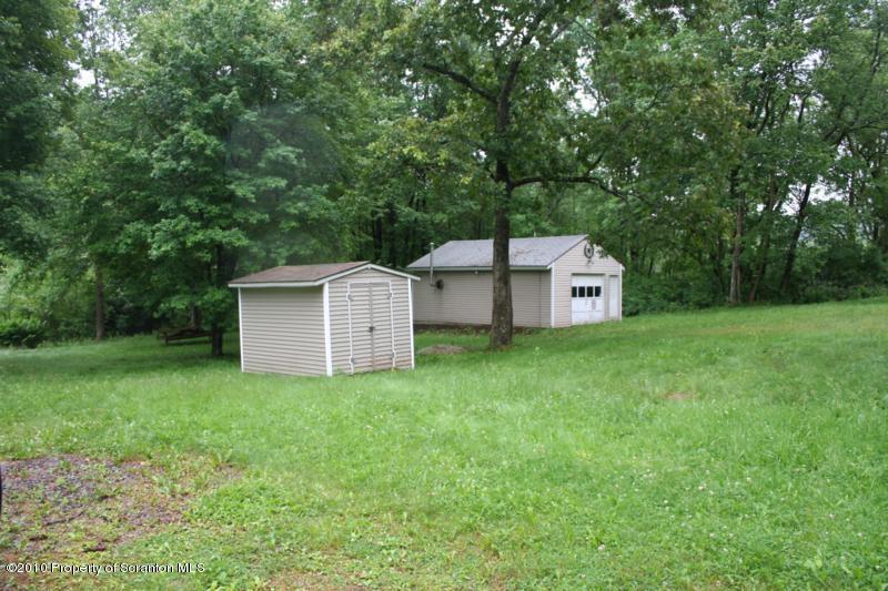 351 R Casterline Road Harveys Lake, PA 18618 - Photo 3 of 13 a house view with a garden space