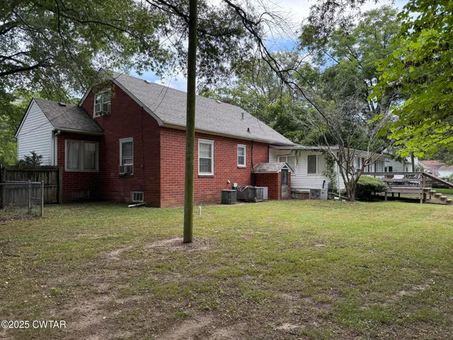a house view with a garden space
