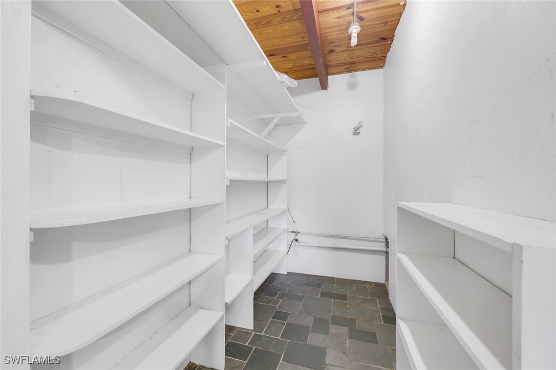 18191 Slater Road North Fort Myers, FL 33917 - Photo 11 of 34 a view of walk in closet with empty racks