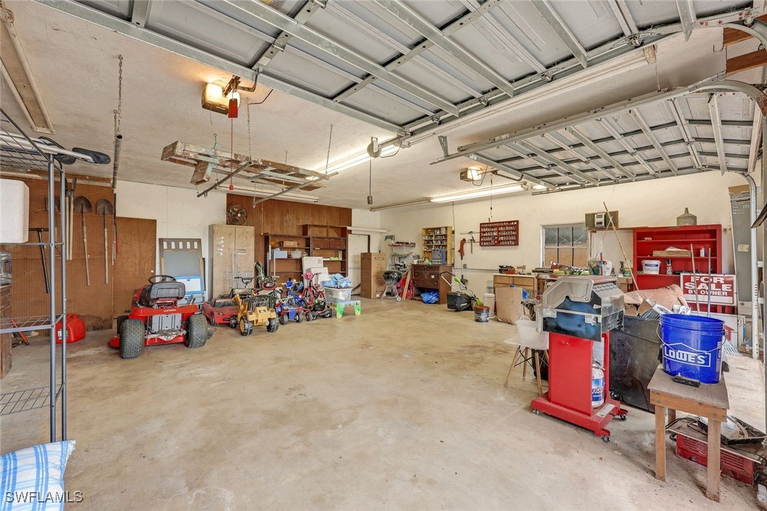 18191 Slater Road North Fort Myers, FL 33917 - Photo 31 of 34 a view of a storage room with lots of stuff