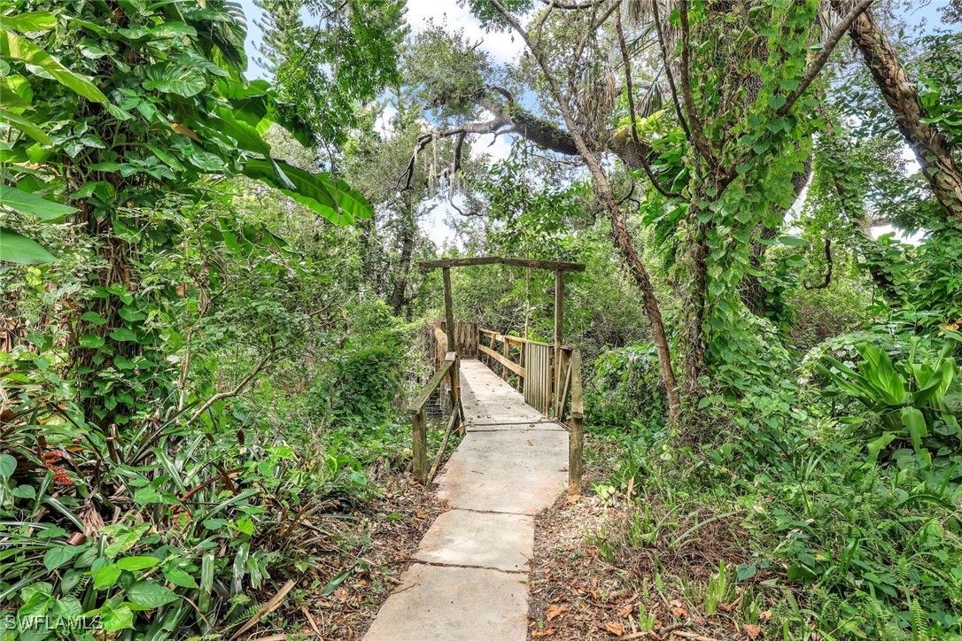 18191 Slater Road North Fort Myers, FL 33917 - Photo 33 of 34 a view of a pathway both side of yard