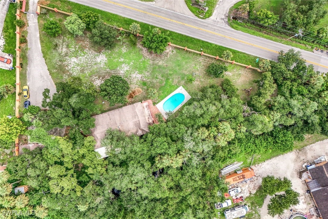 18191 Slater Road North Fort Myers, FL 33917 - Photo 34 of 34 a view of a small yard with potted plants