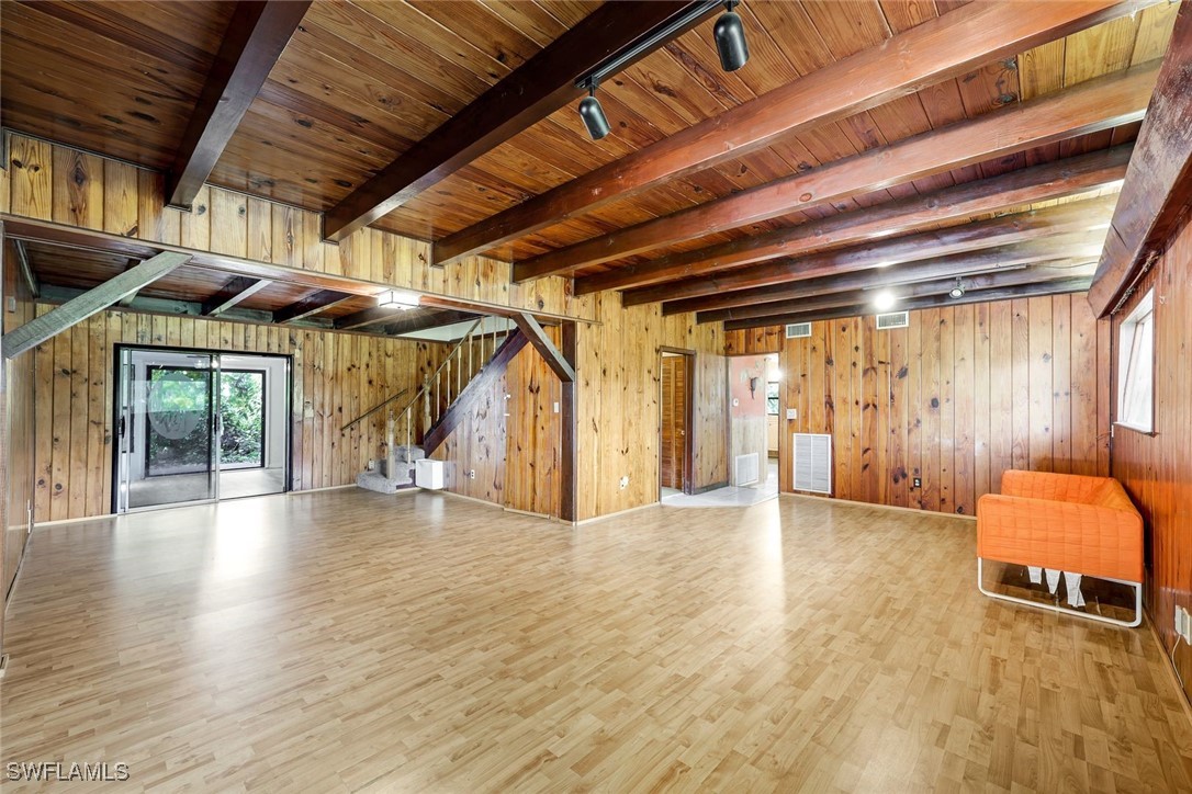 18191 Slater Road North Fort Myers, FL 33917 - Photo 8 of 34 a view of room with wooden floor