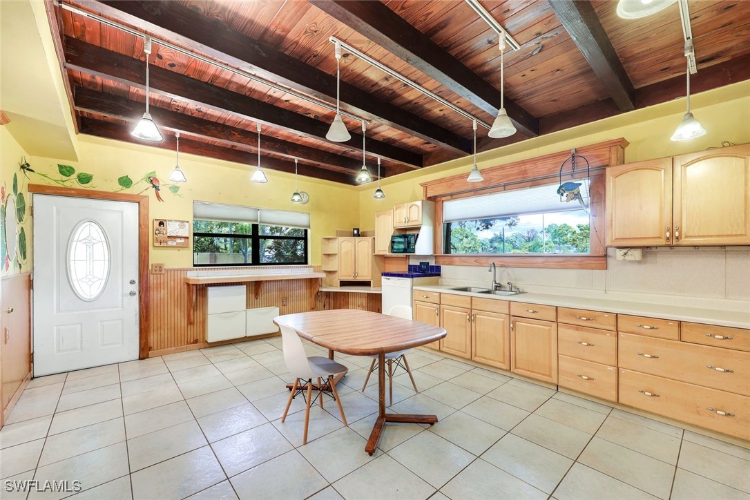 18191 Slater Road North Fort Myers, FL 33917 - Photo 9 of 34 a large white kitchen with a large window