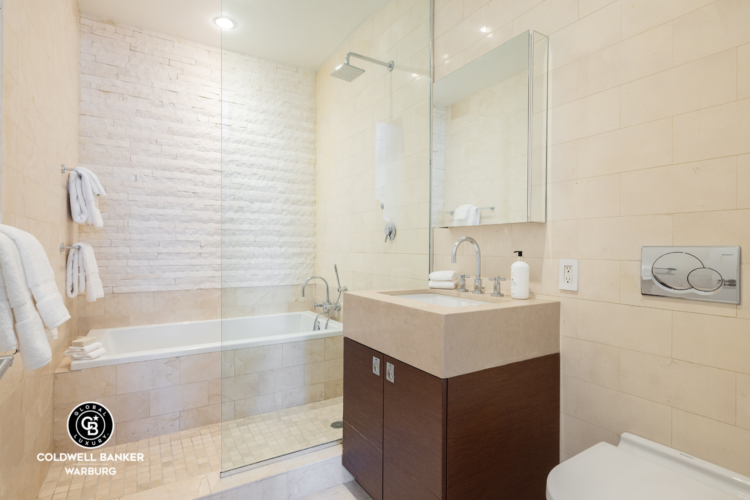 157 East 84th Street, Unit PH Manhattan, NY 10028 - Photo 10 of 17 a bathroom with a sink a toilet and a bathtub