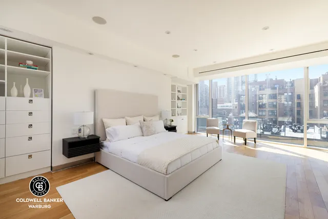 a room with furniture and flat screen tv