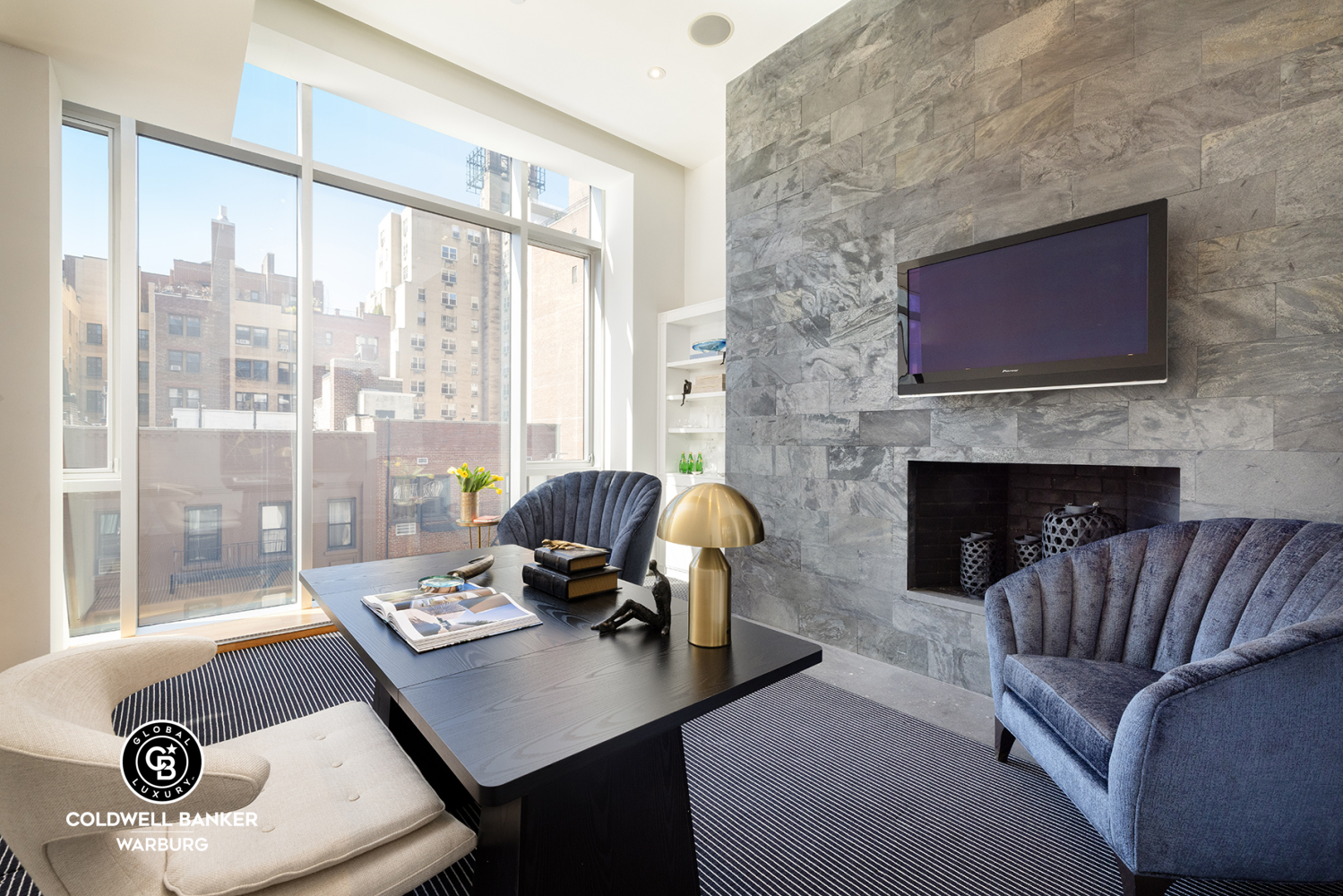 157 East 84th Street, Unit PH Manhattan, NY 10028 - Photo 3 of 17 a living room with furniture and a fireplace